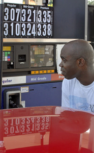 Wayne Parkins of Mount Airy fills his Volkswagen at the Liberty station on Butler Pike in Plymouth Meeting. Regular gas was $3.07 yesterday.