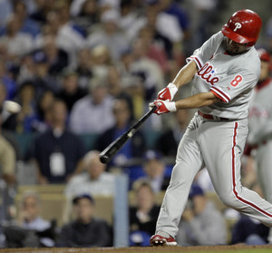 Centerfielder Shane Victorino blasts a game-tying two-run home run in the eighth inning off Dodgers reliever Cory Wade, who was charged with the loss.
