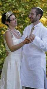 Ken Rosso and Zoe Cohen at their wedding. Rosso plans to take Cohen's more Jewish-sounding name to honor his faith.