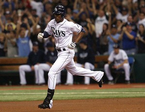 Tampa Bay's B.J. Upton circles the bases after hitting a home run, something he's done seven times this postseason.