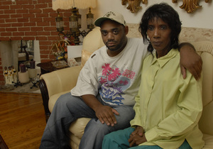 Ruby Spencer with her son Dennis at her homein Logan. "I can't wait till I'm 65 to get Medicare," she said. "I'll probably be dead by then."