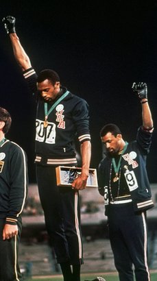 The gloved Tommie Smith (left) and John Carlos, on Oct. 16, 1968.
