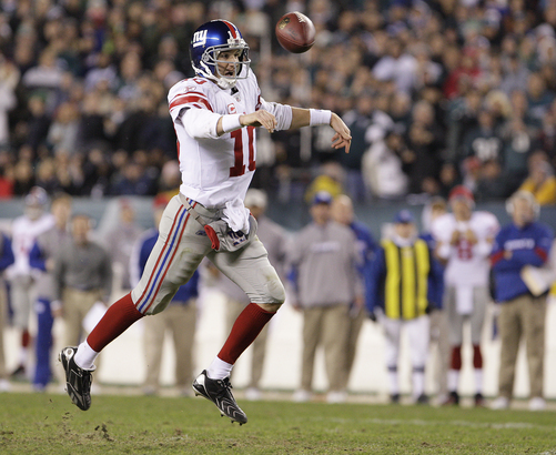 New York Giants quarterback Eli Manning releases a pass in the