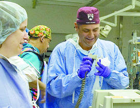 John P. Pryor at work in the Hospital of the University of Pennsylvania trauma center last year. He died from enemy fire on Christmas in Iraq.