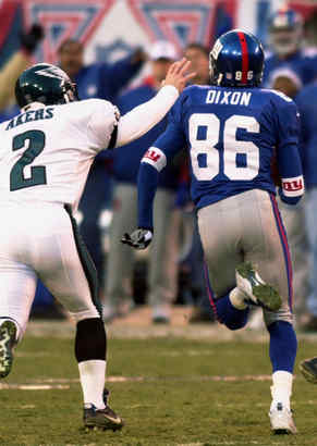 New York Giants Eli Manning celebrates after Plaxico Burress catches a 9  yard touchdown pass in the second quarter against the Philadelphia Eagles  at Giants Stadium in East Rutherford, New Jersey on