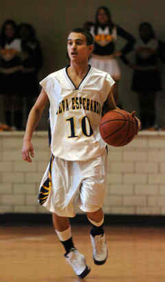 Esperanza's Andy Bousono looks for one of his nine assists.