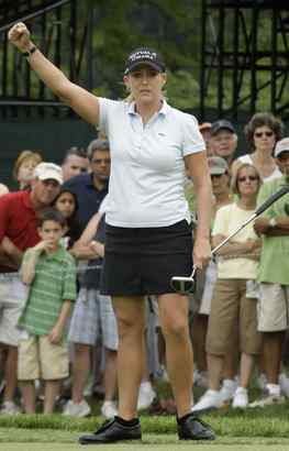 Cristie Kerr celebrates her par putt on the 11th green during the third round of the U.S. Women&acute;s Open in Bethlehem. She ended her day with pars at 17 and 18.