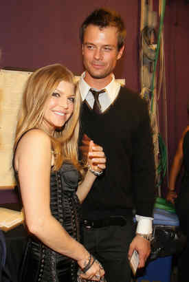Fergie and Josh Duhamel are all smiles in a 2007 photo. But now, rumors swirl.