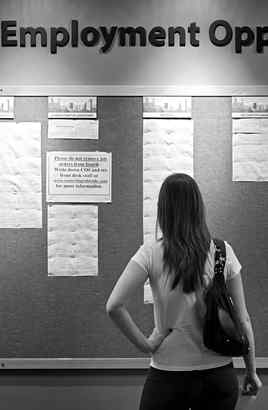 An unemployed worker peruses listings for medical jobs in Denver. Many jobless people whose benefits are nearing an end will find the latest federal extension of relief is no help.