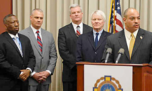 Among key staff appointments announced yesterday by D.A. Seth Williams is that of Christopher Werner (second from left) as chief of county detectives.