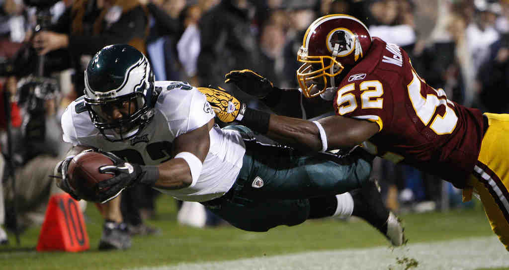 Vick leads Eagles over Redskins 34-10 – Daily Local