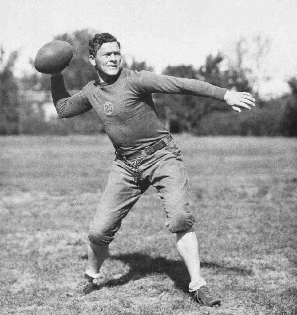 Coach Earl Curly Lambeau, right, just named coach of the Chicago