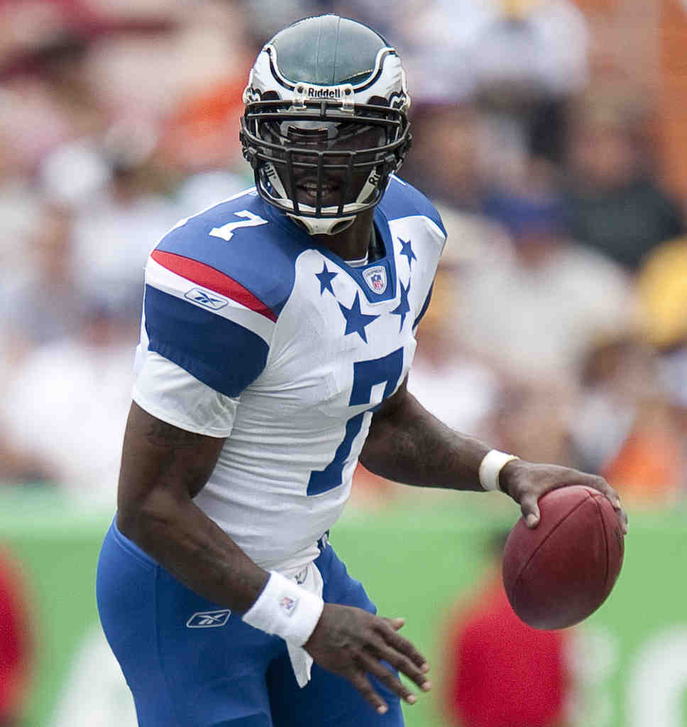 Atlanta Falcons quarterback MIchael Vick warms up before a 27 to