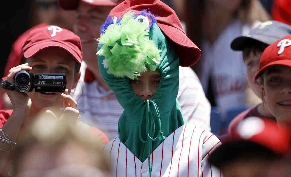 Woman covers face with lipstick at Phillies game