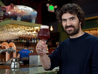 Giovanni Campari, brewmaster of Italy’s Del Ducato, raises a glass of Belgian Oud Beersel at Alla Spina. “Beer-making,” he says, “is my way to express myself.” DAVID M WARREN / Staff Photographer
