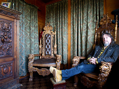 Mike Walzer is posing for photo sitting a gothic chair in sun room.    (AKIRA SUWA / Staff Photographer )