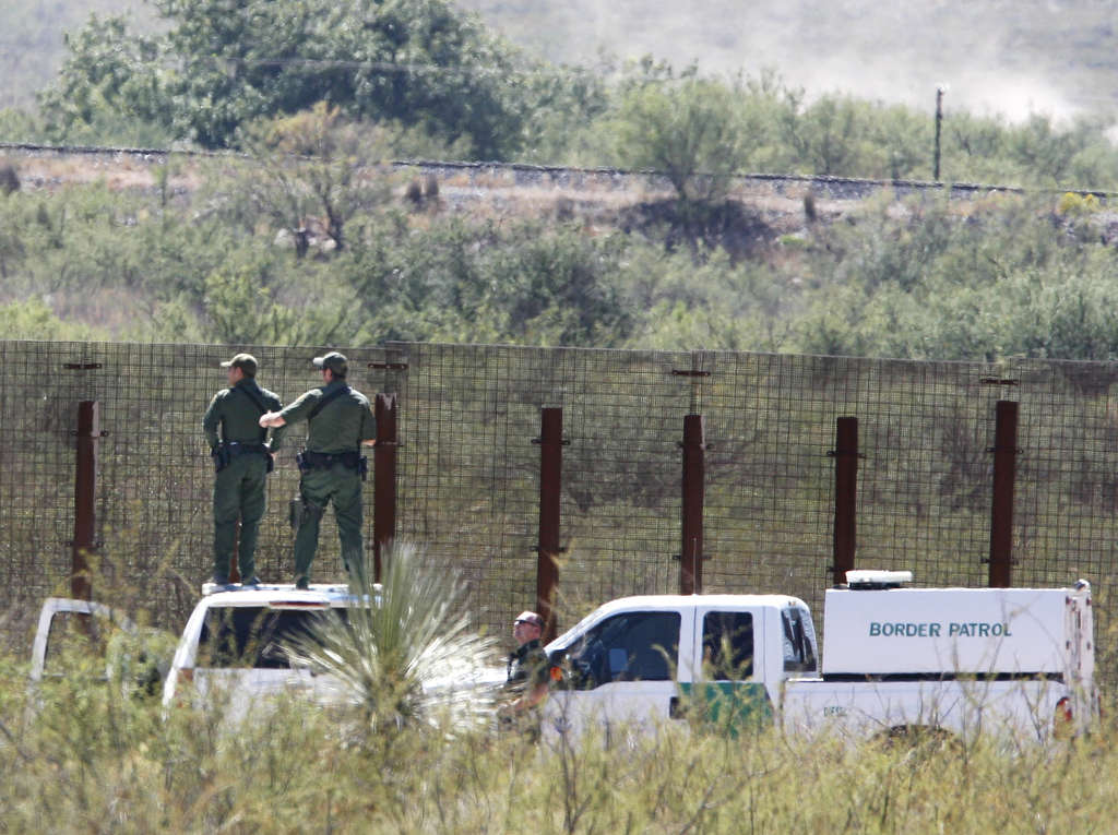 Two arrested in probe of border agent's death
