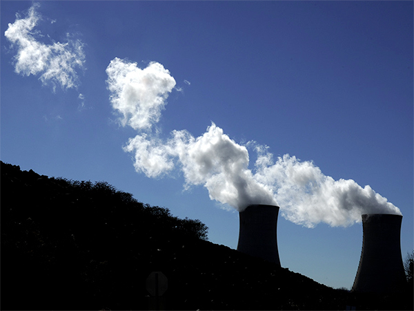 Clouds of condensed water vapor leave the cooling towers of the Limerick nuclear power plant in Pottstown Monday, November 18, 2013. CLEM MURRAY / Staff Photographer