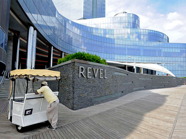 Rolling Chair operator Jean Desir waiting for fares near the Revel in Atlantic City on Thursday.