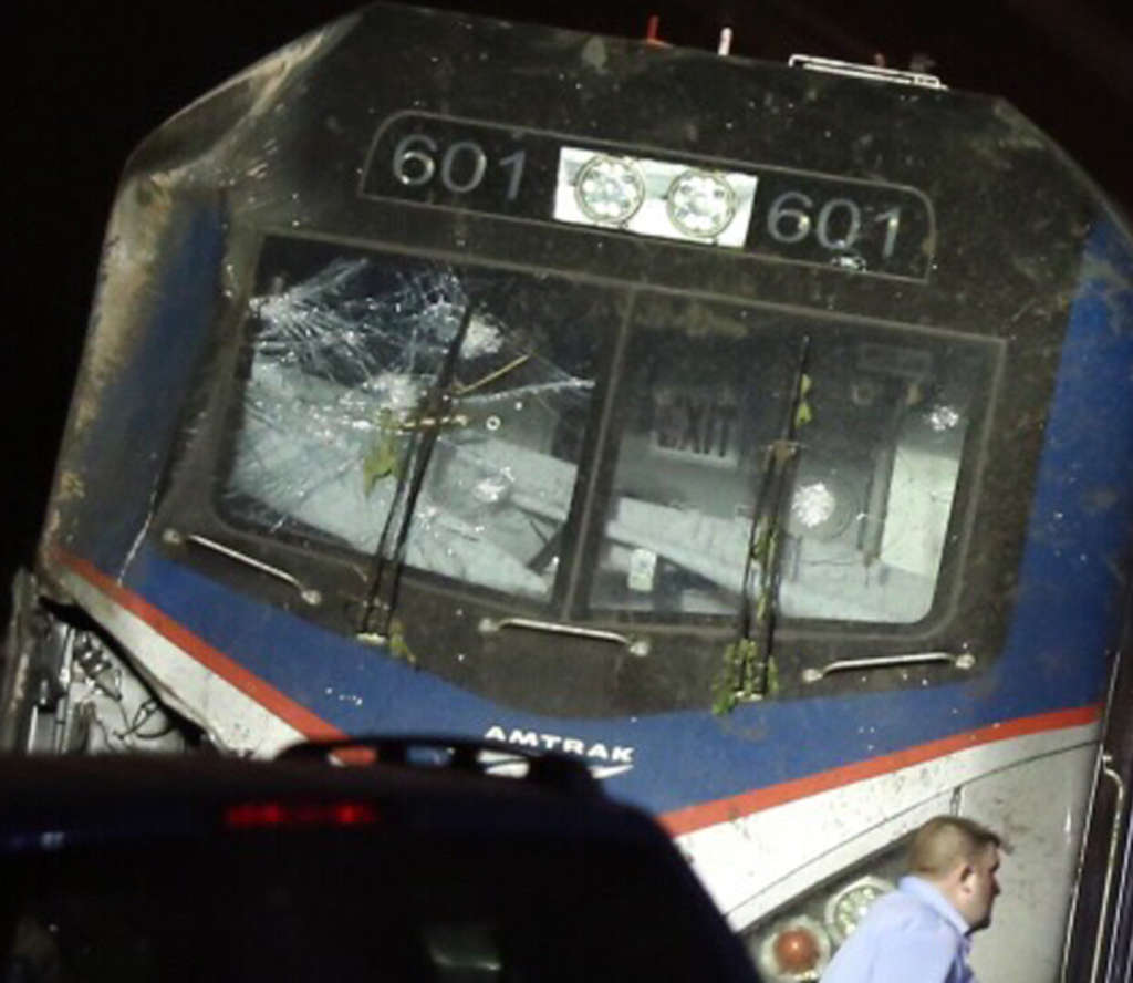 Train derailment investigation widens: Did a projectile hit the windshield?