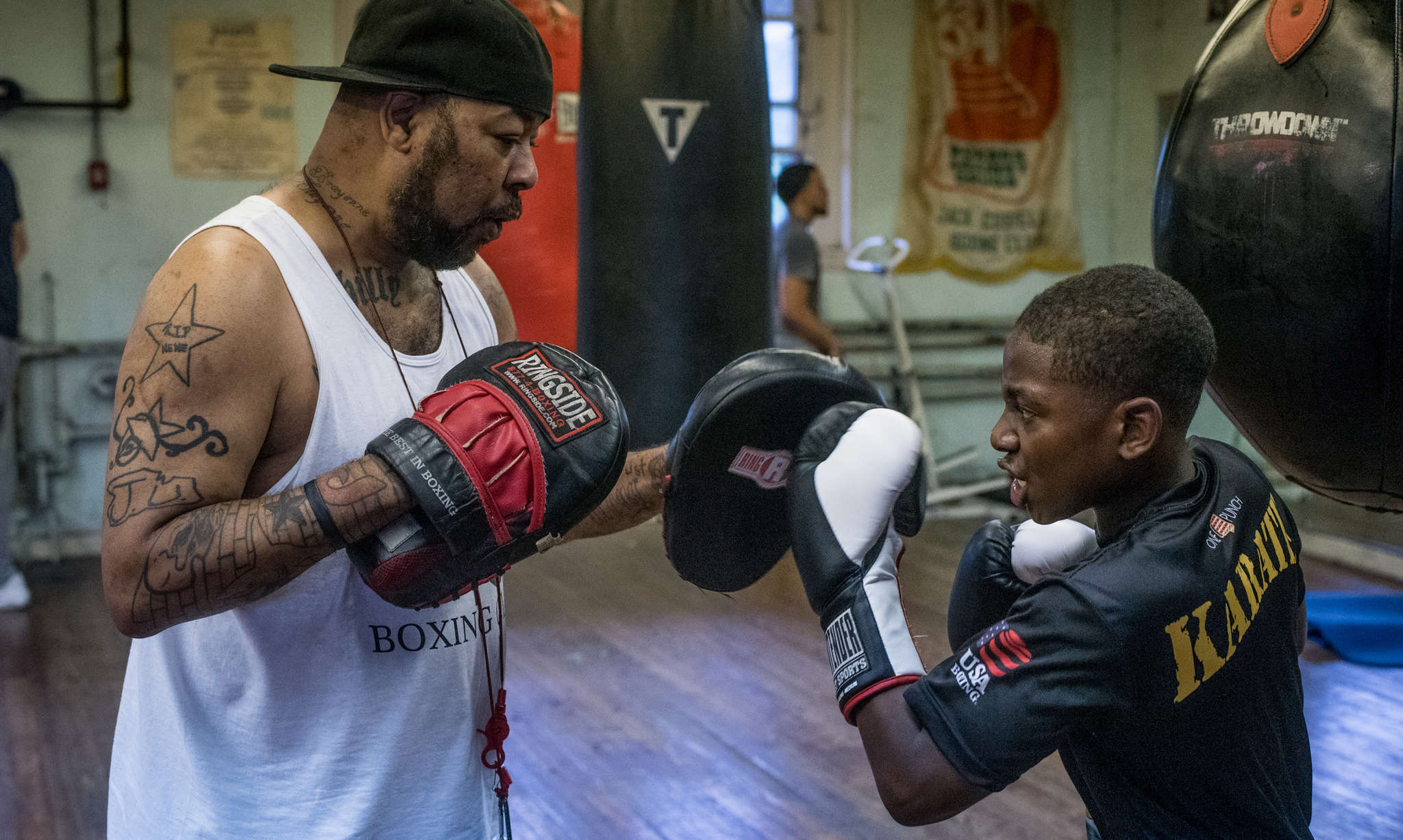 At Philly boxing clubs, retro sport takes on modern ills photo