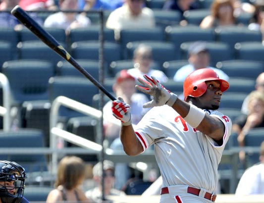 Philadelphia Phillies baseball player Ryan Howard waves as he is introduced  during a news conference, to announce a donation from the Ryan Howard Family  Foundation to the School District of Philadelphia, at