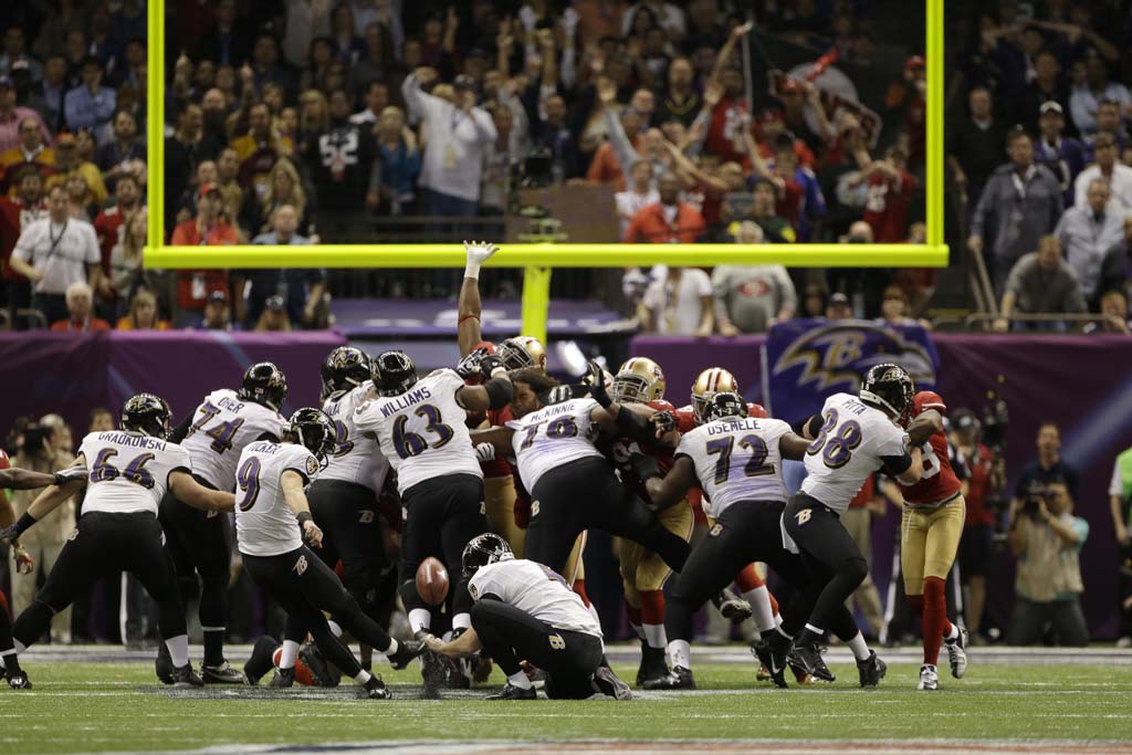 Ravens overcome rally, blackout to surge to second title