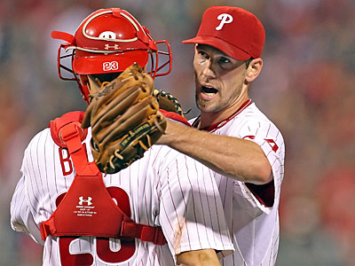 Philadelphia Phillies catcher Paul Bako congratulates pitcher Cliff Lee, who pitched a complete game against the Arizona Diamondbacks at Citizens Bank Park, Wednesday, IN AN 8-1 WIN. (Steven M. Falk/Staff Photographer)