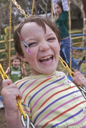 Elizabeth Buell-Fleming, who just turned 5, plays in her Delaware back yard. 