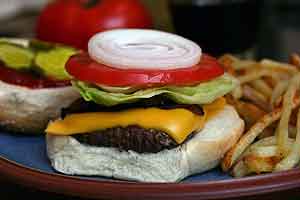 When asked, many restaurant patrons will opt for smaller food portions. (Larry Crowe / AP Photo)