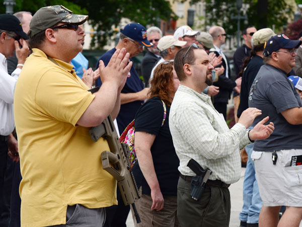 Rich Bishop, left, of Wilmington, Del., attends the 10th annual Second<br />Amendment Action Day rally on the steps of the Pennsylvania Capitol on Tuesday, May 12, 2015, in Harrisburg. (AP Photo/Marc Levy)