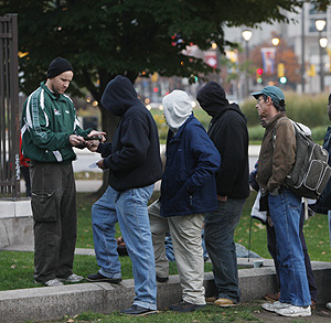Adam Bruckner (left) of Restart, which helps the homeless get meals and identification. <br />