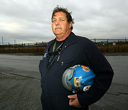 Sunoco refinery worker John Read is delaying his retirement because of the economy. Hang out at home? Play with the grandkids? That&acute;s on hold.  