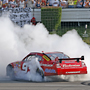 Winner of the 2008 Pocono 500 Kasey Kahne does a burn-out after the race for the fans in Long Pond, Pa., Sunday, June 8, 2008.  Steven M. Falk / Philadelphia Daily News<br />