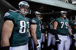 Philadelphia waits to take the field against Washington at the end of the 2011 season. A new study says that controlling weight later in life plays a big role in cognitive functioning.