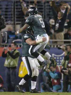 The Philadelphia Eagles' Terrell Owens tests his ankle during Media Day for  Super Bowl XXXIX on Feb. 1, 2005, in Jacksonville, Fla. The Eagles will  play the New England Patriots for the