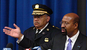 Mayor Nutter (right) and Police Commissioner Charles H. Ramsey talking about challenges to the city´s new gun laws.