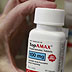 The drug Topamax is held by a pharmacist at Maximart Pharmacy in Palo Alto, Calf. Qnexa is a combination of two older drugs: the amphetamine phentermine and topiramate, an anticonvulsant drug sold by Johnson & Johnson as Topamax. (AP Photo/Paul Sakuma)