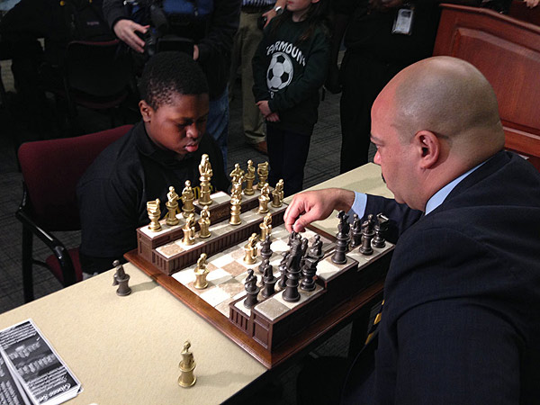  - Seth-Williams-playing-chess-with-students-600