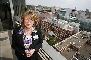 Madeline Bell, chief operating officer at Children’s Hospital of Philadelphia, on her office balcony that overlooks Penn’s medical campus. In making the $60 million in budget cuts, she said, “we engaged front-line staff in helping us set targets and look at solutions.”<br />