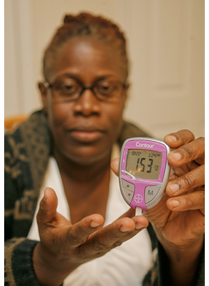 Vanessa Sheppard, of South Philly, had to borrow test strips from friends and family to monitor her blood sugar. Blood-glucose test strips have become a pricey necessity for diabetics. (Akira Suwa / Staff Photographer)