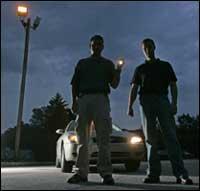 Lead FBI agent Jason Huff (right) asked permission for his squad to keep an eye on Akhil Bansal, in case he tried to flee. It was a good call. Huff and Special Agent Special Agent Shannon E. Clark (left) were among the agents who arrested Akhil. Agents rounded up suspects on the East County and in India.