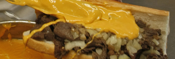 Cheez Whiz being slathered on at Pat&acute;s King of Steaks.