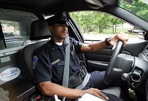 Officer Mark Crawford of the Chester Police department cruises the streets. “My dream as a kid was to be a cop,” says Crawford, who grew up in Chester.<br />