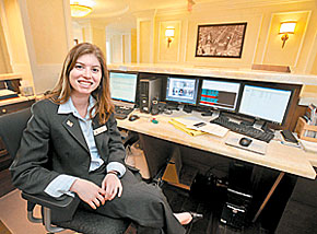 In the lap of luxury, residents’ tasks often fall into the lap of concierge Jamie Cooperstein, a graduate student of hospitality at Temple. (Clem Murray / Inquirer)