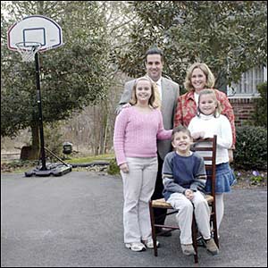 Laura and Brian Cooper, with their children Emily (left), Christopher and Gabrielle.
