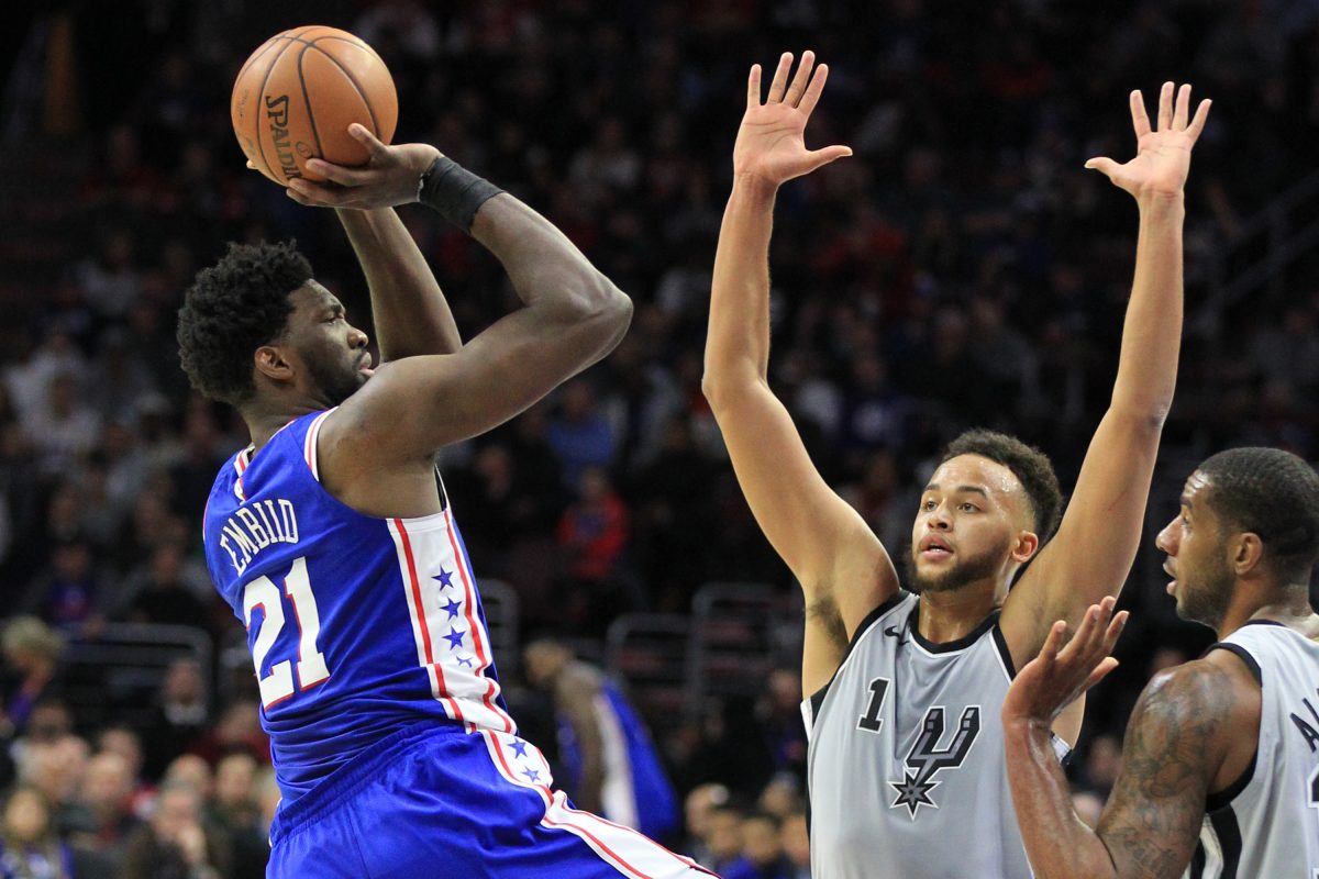 Joel Embiid plays with sprained hand, leads Sixers to 112-106 victory over undermanned Spurs