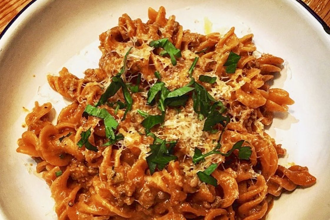 A spicy sausage Calabrese Bolognese at Hungry Pigeon made with chile pepper-infused fusilli from Little Noodle Co.