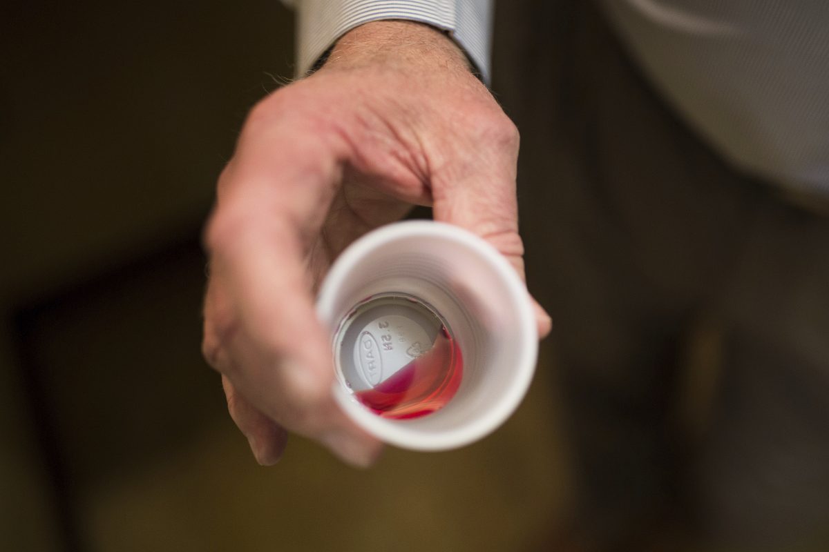 Paul “Rip” Connell, CEO of a Georgia methadone clinic, shows a liquid dose. 