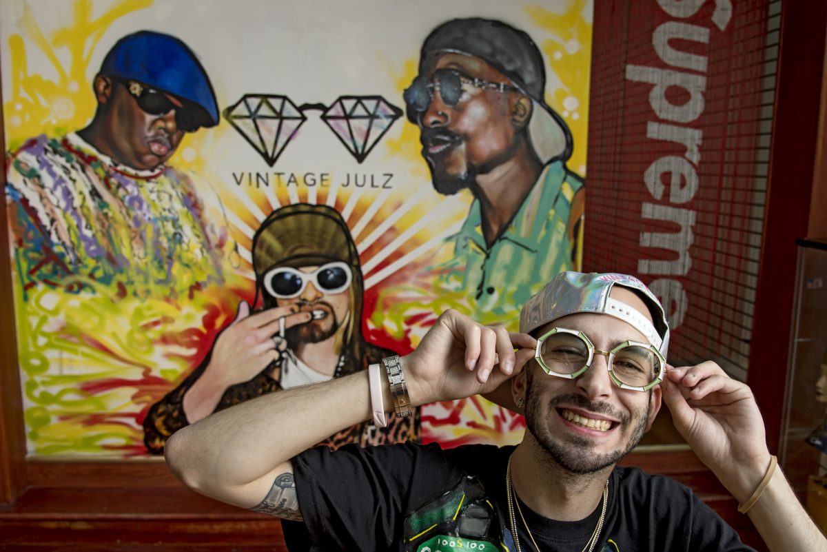 Julz, a.k.a. Julian Emami, in a pair of $2,000 Dior vintage sunglasses from 1986,  in his store Vintage Julz on South Street.  